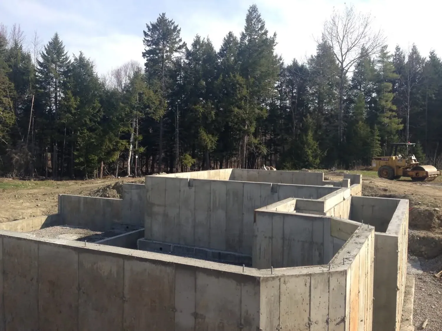 Poured concrete foundation walls on a job site in southern Maine